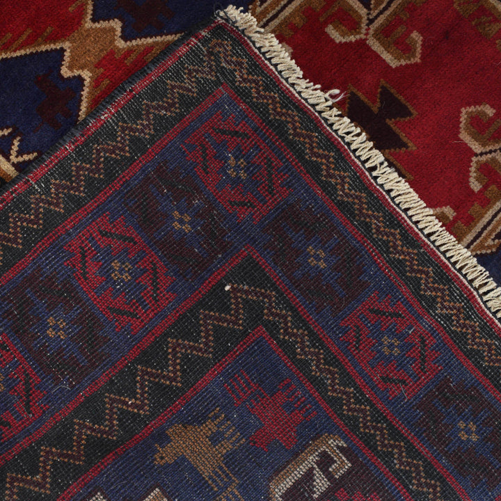 Red Afghan Baluchi Rug 4' 2" x 6' 6" Hand-Knotted border
