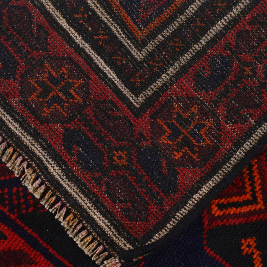 Navy Blue Afghan Baluchi Rug 4' 2" x 6' 5" Hand-Knotted close-up