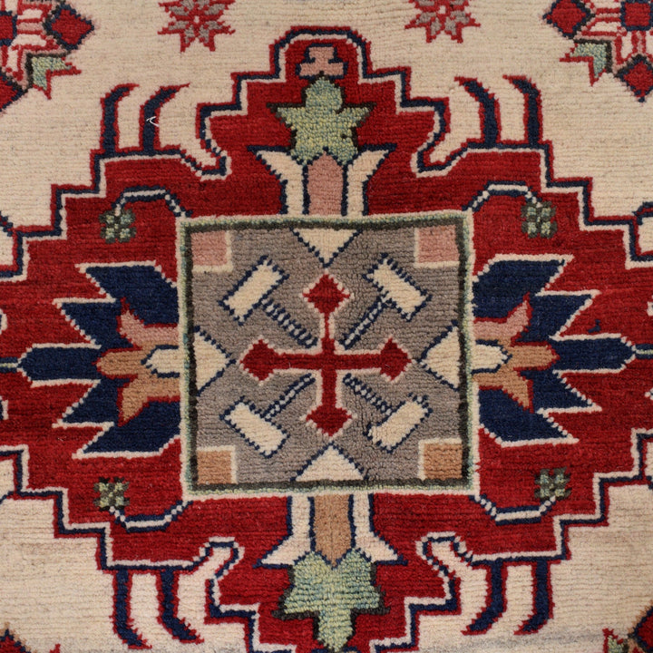 Beige Afghan Kazak Rug 4' 10" x 6' 9" Hand-Knotted close-up