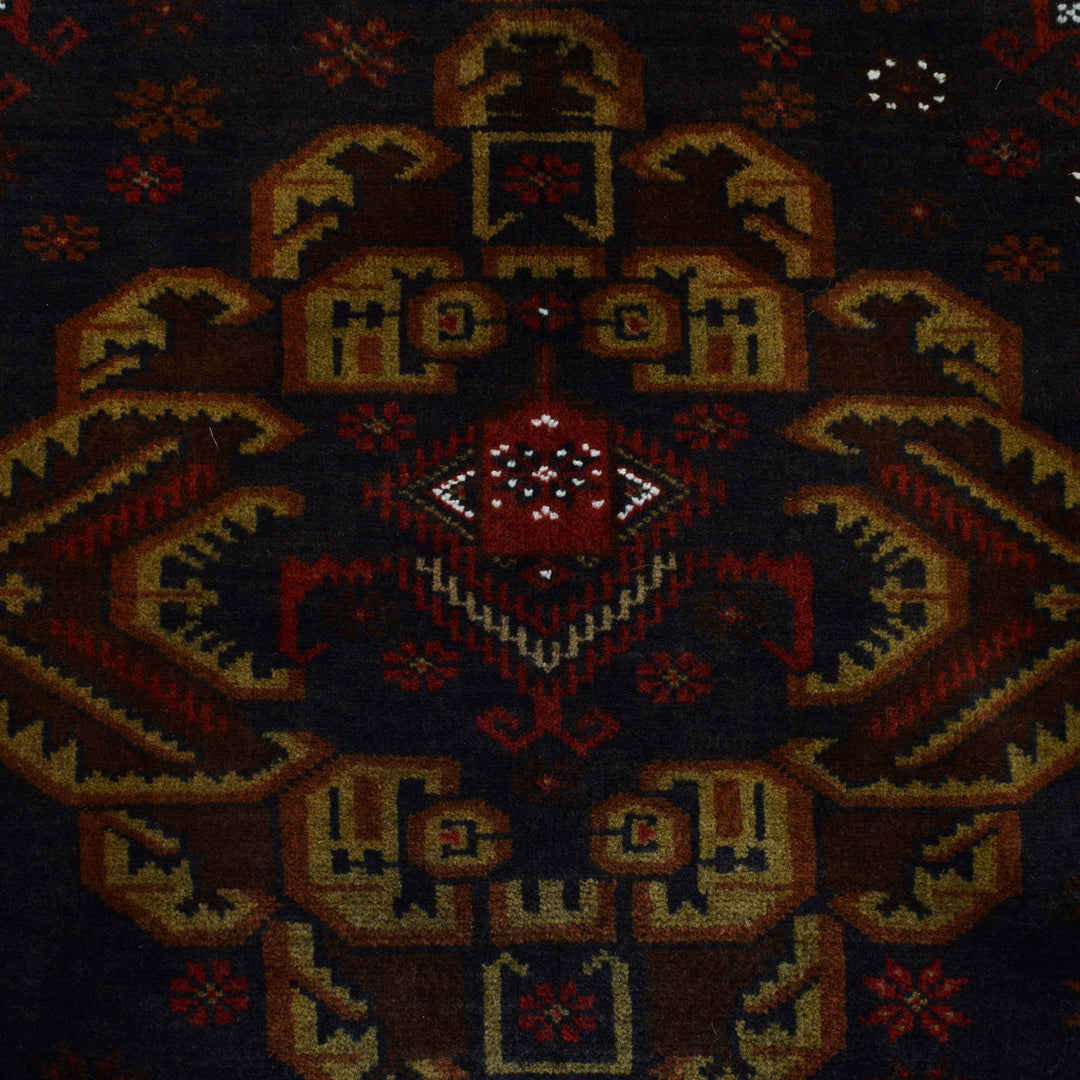 Afghan Baluchi Rug 4' 7" x 6' 10" Hand-Knotted close-up