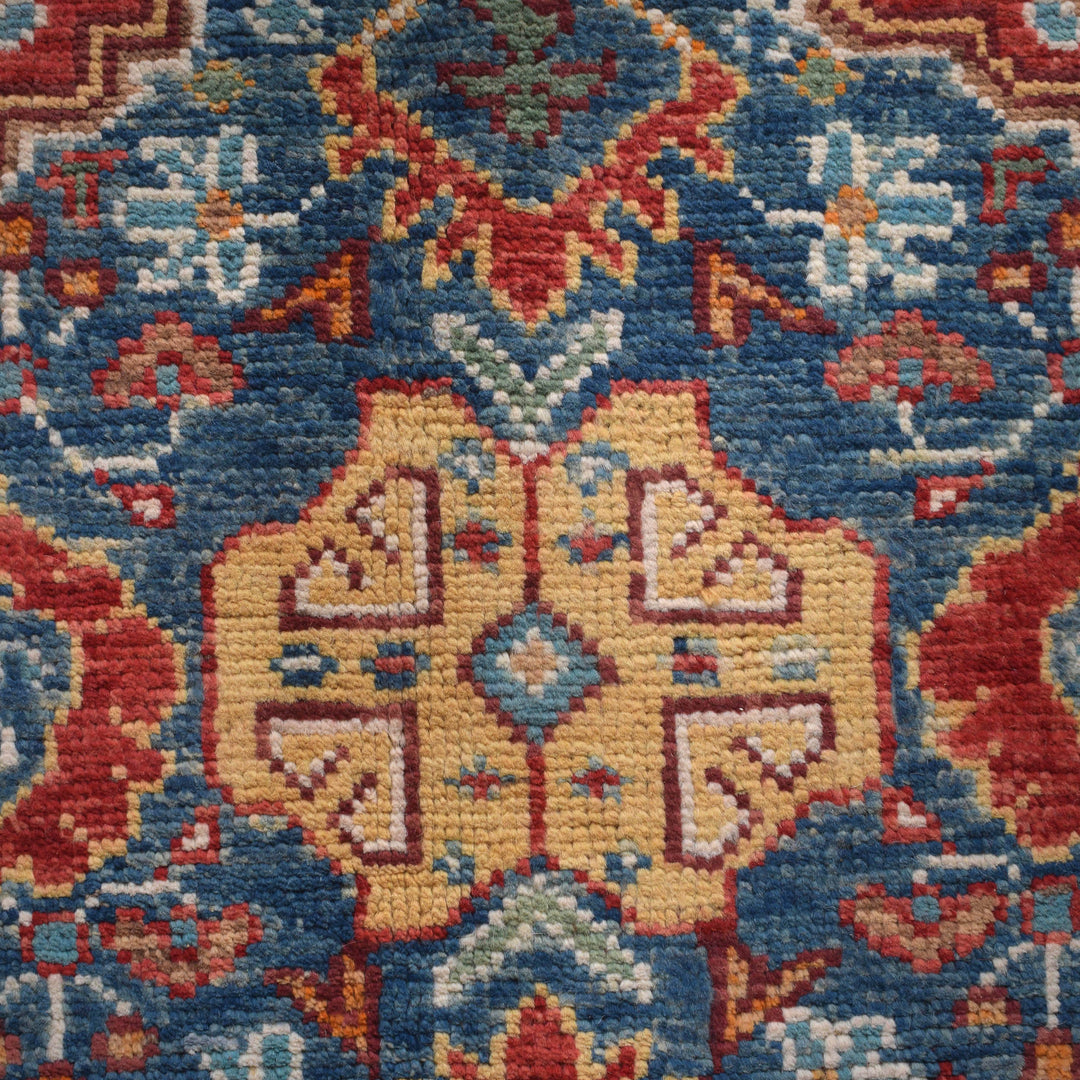 Red Afghan Shirazi Rug 6' 9" x 9' 7" Hand-Knotted close-up
