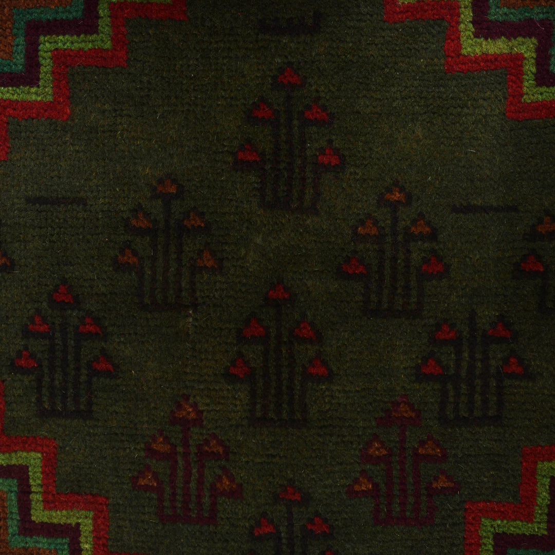Afghan Baluchi Rug 4' 5" x 5' 10" Hand-Knotted close-up