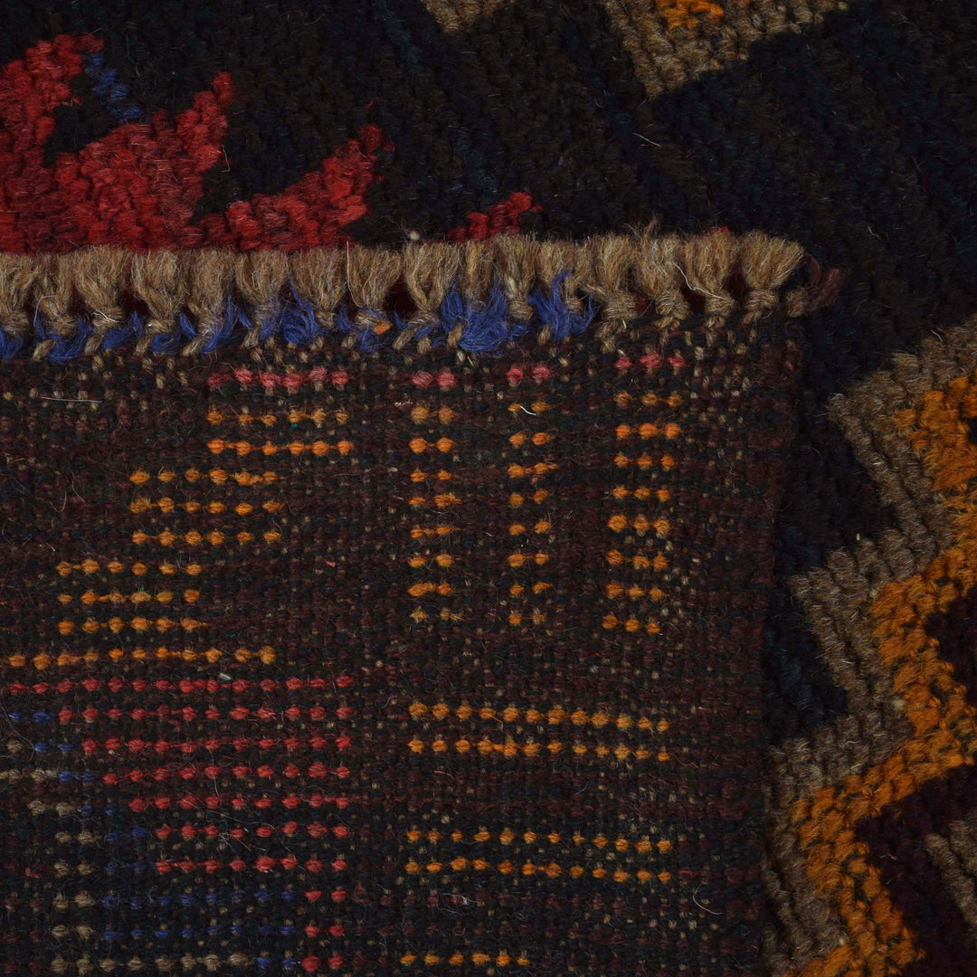 Red Afghan Baluchi Rug 2' 7" x 4' 6" Hand-Knotted close-up
