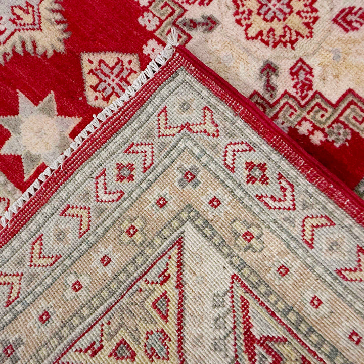 Red Afghan Kazak Rug 6' 8" x 9' 8" Hand-Knotted border