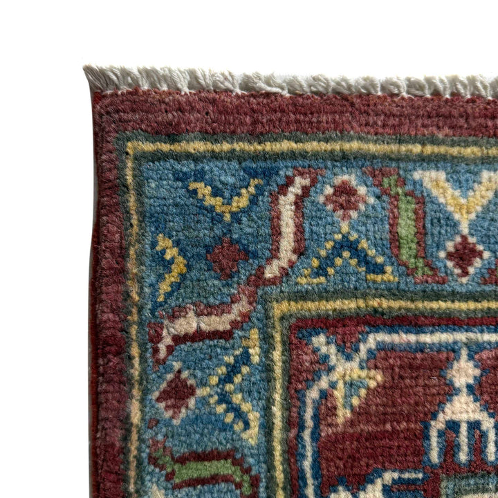 Hand knotted Kazak Carpet 6' 8" x 9' 11" - No. AL17556