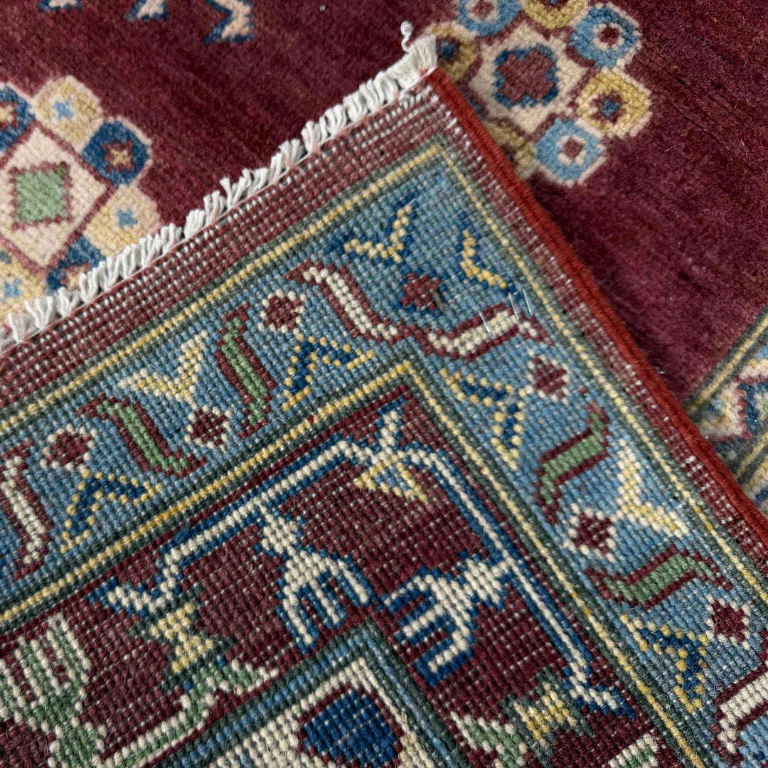 Hand knotted Kazak Carpet 6' 8" x 9' 11" - No. AL17556