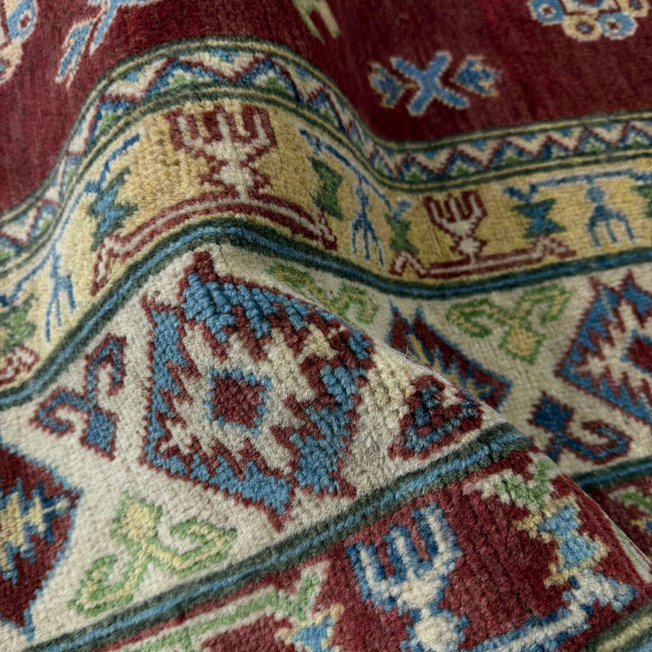 Hand knotted Kazak Carpet 6' 8" x 9' 11" - No. AL17556
