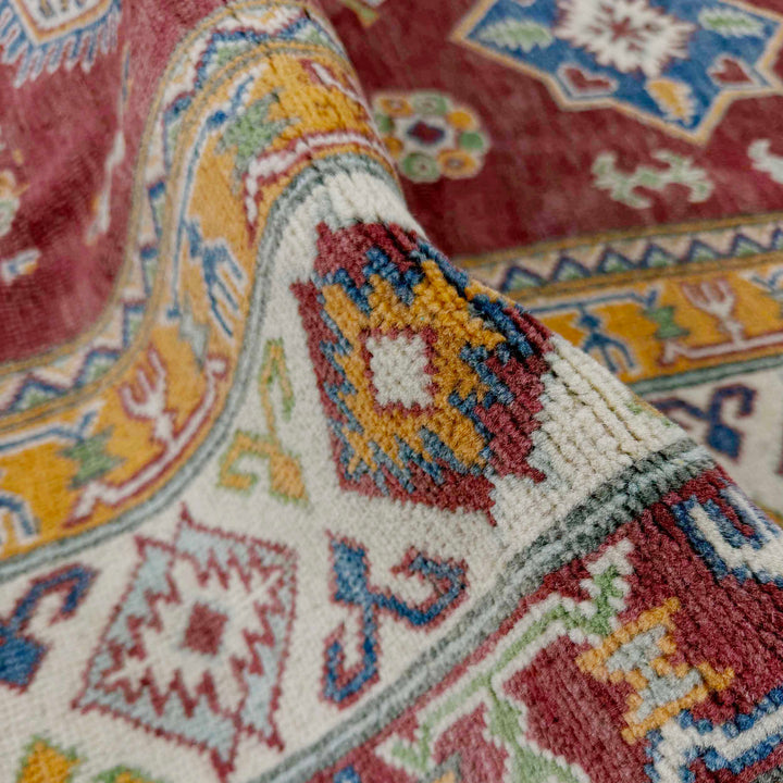 Red Afghan Kazak Rug 6' 7" x 9' 11" Hand-Knotted texture