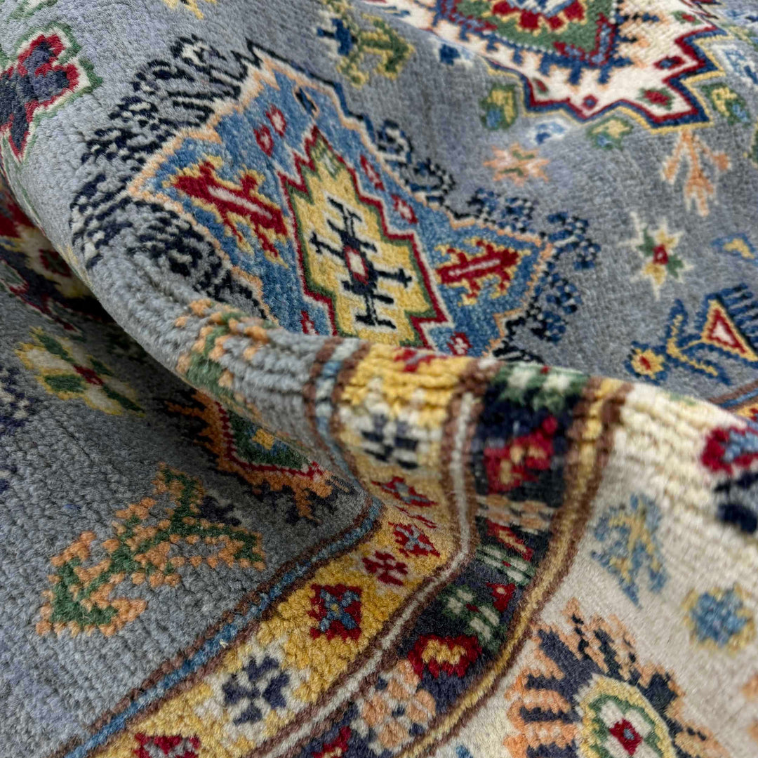 Gray Afghan Kazak Rug 4' 0" x 6' 1" Hand-Knotted texture