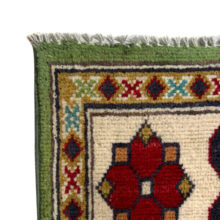Green Afghan Kazak Rug 4' 11" x 6' 4" Hand-Knotted | No. AL84629