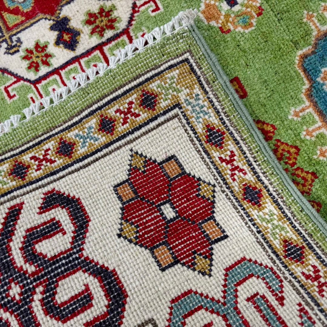 Green Afghan Kazak Rug 4' 11" x 6' 4" Hand-Knotted | No. AL84629