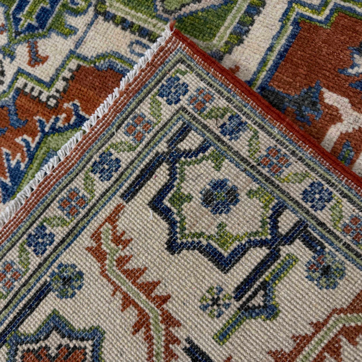 Afghan Heriz Rug 5'1" x 7'0" Hand-Knotted border