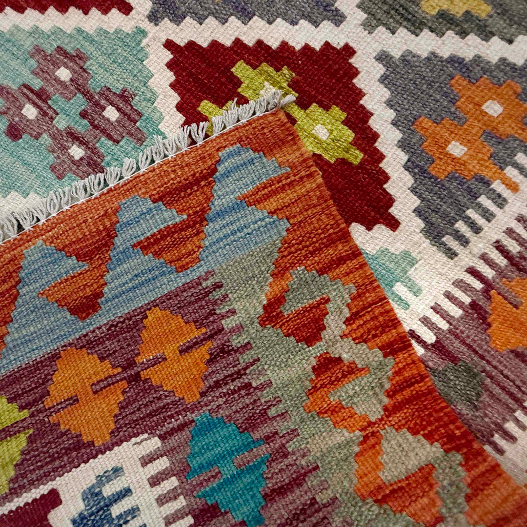 Afghan Kilim Rug 4' 11" x 6' 4" Flat-Weave border