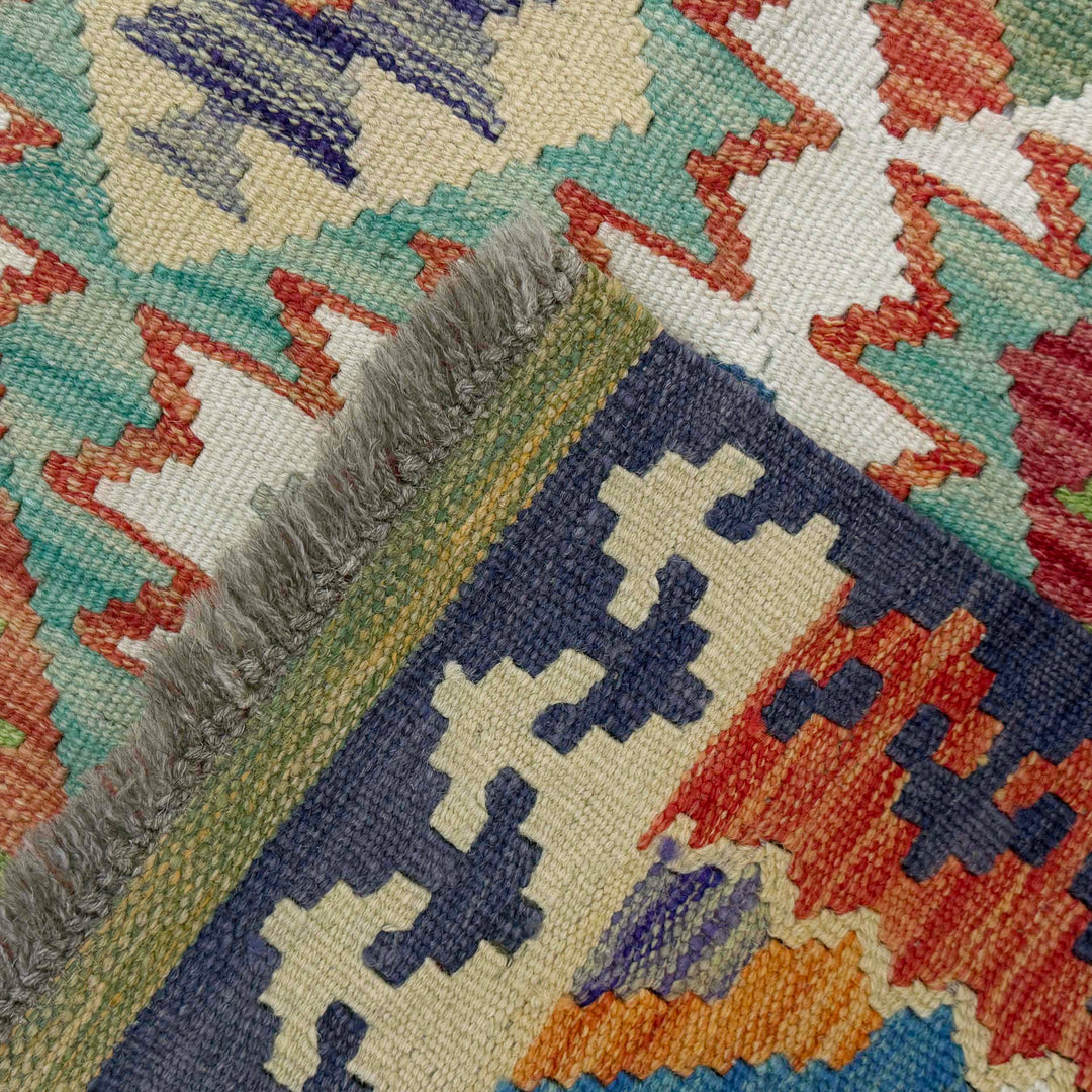 Afghan Kilim Rug 5' 3" x 6' 5" Flat-Weave border
