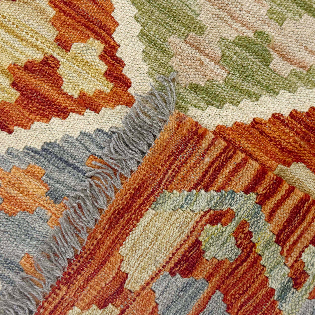 Afghan Kilim Rug 4' 2" x 5' 8" Flat-Weave border