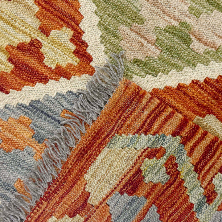 Afghan Kilim Rug 4' 2" x 5' 8" Flat-Weave border