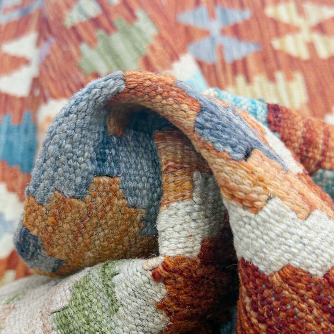 Afghan Kilim Rug 4' 2" x 5' 8" Flat-Weave texture
