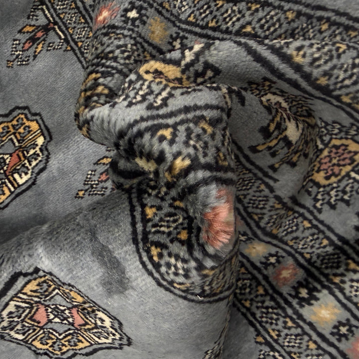 Gray Pakistani Bokhara Rug 6' 8" x 9' 8" Hand-Knotted texture