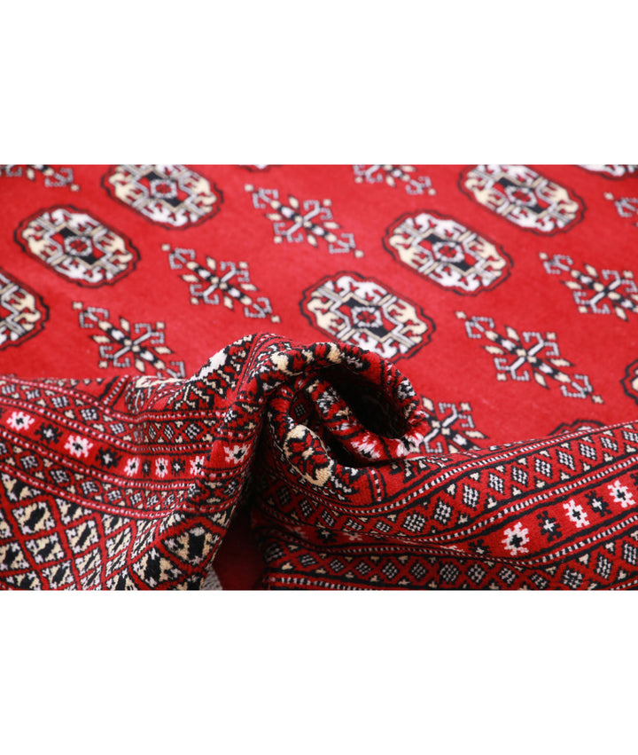 Red Pakistani Bokhara Rug 8' 2" x 10' 0" Hand-Knotted | No. AT39208