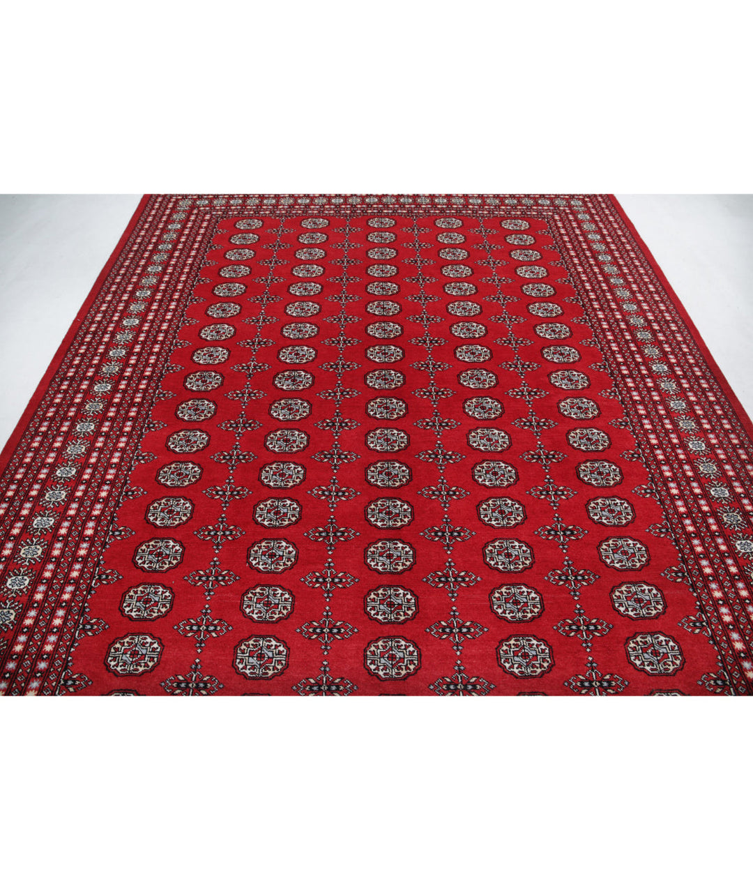 Red Pakistani Bokhara Rug 8' 0" x 10' 1" Hand-Knotted | No. AT16670