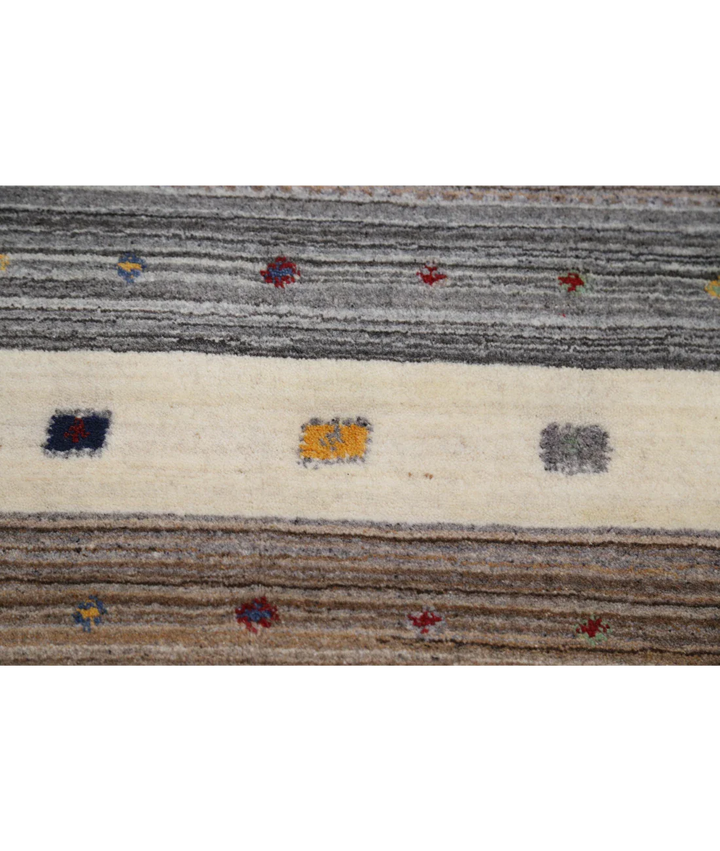 Ivory Indian Oriental Rug 6' 8" x 9' 9" Hand-Knotted close-up