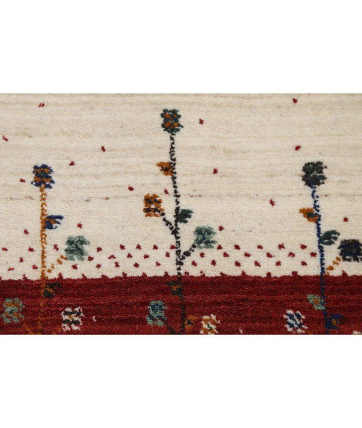 Ivory Indian Lori Rug 4' 8" x 6' 6" Hand-Knotted close-up