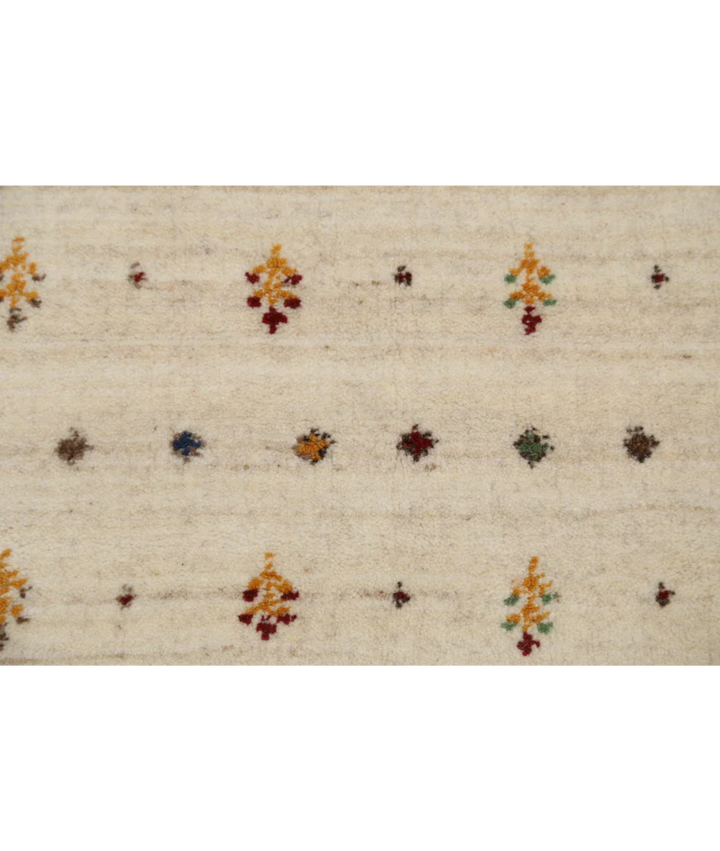 Ivory Indian Lori Rug 5' 8" x 7' 10" Hand-Knotted close-up