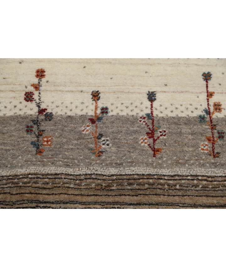Ivory Indian Oriental Rug 4' 6" x 6' 5" Hand-Knotted close-up
