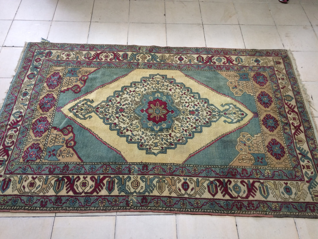 Tan Turkish Oushak Rug 4' 5" x 7' Hand-Knotted close-up
