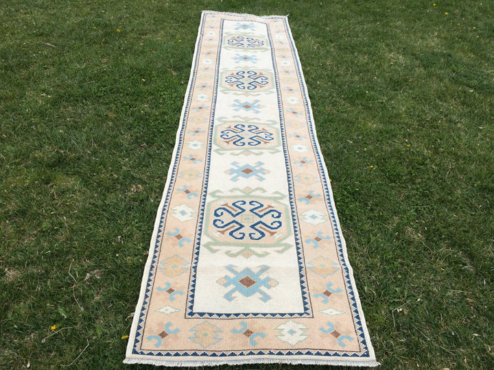 Beige Turkish Runner Rug 3' x 11' Hand-Knotted texture