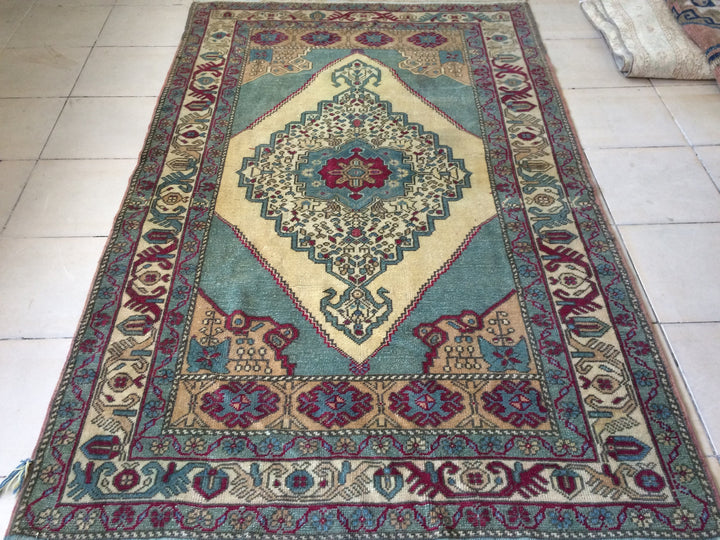 Tan Turkish Oushak Rug 4' 5" x 7' Hand-Knotted pattern