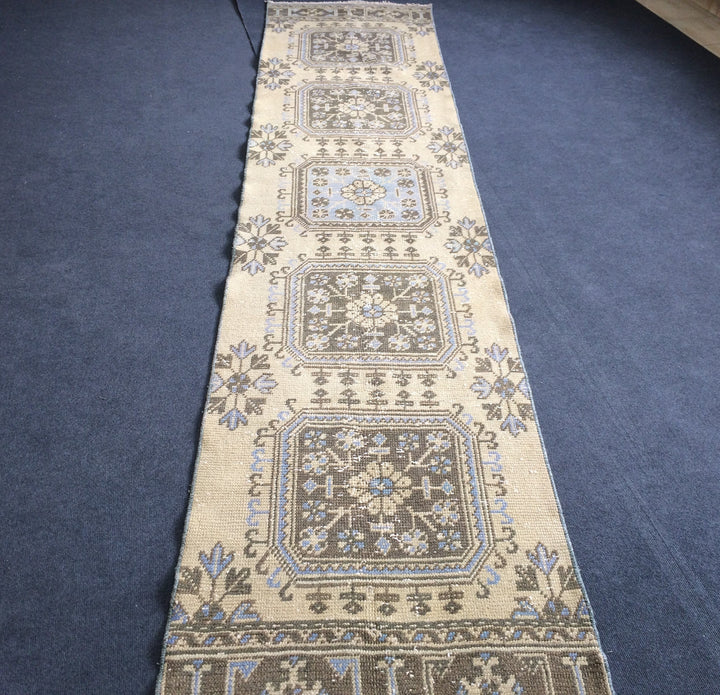 Beige Turkish Runner Rug 2' 8" x 12' Hand-Knotted texture