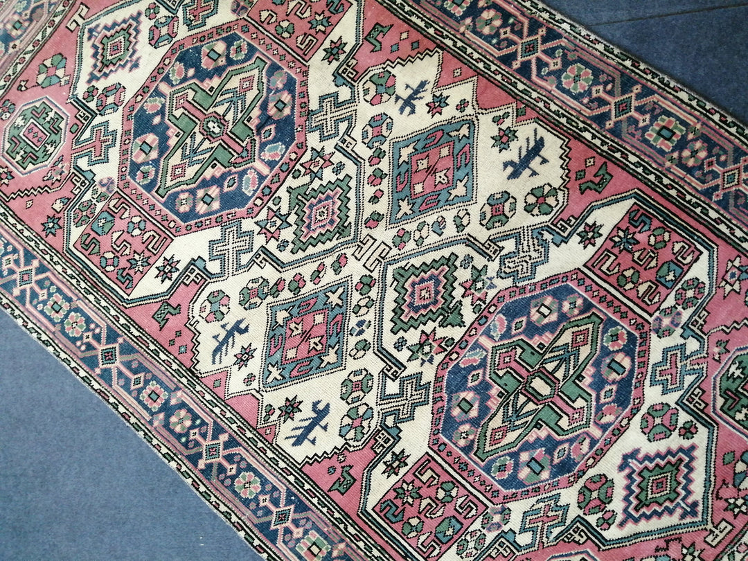 Pink Turkish Runner Rug 4' 5" x 7' 8" Hand-Knotted close-up