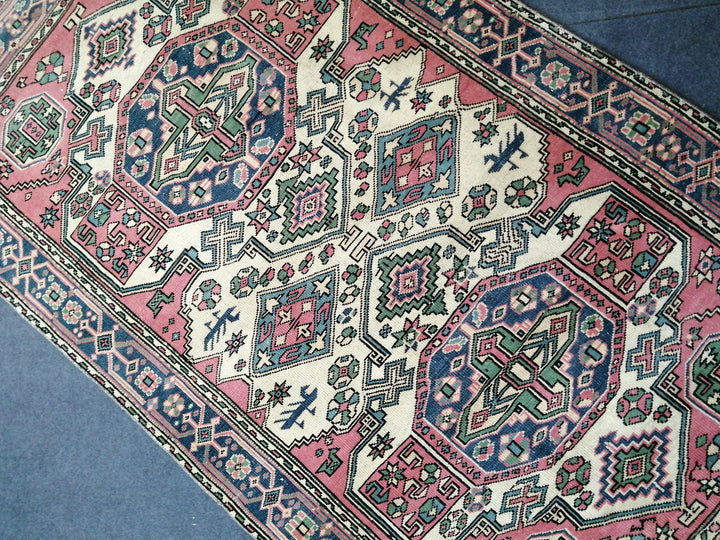 Pink Turkish Runner Rug 4' 5" x 7' 8" Hand-Knotted close-up