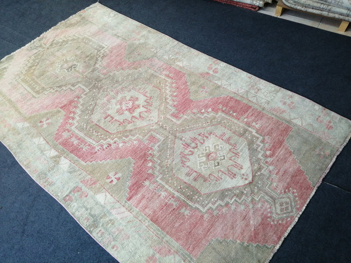 Pink Turkish Runner Rug 5' x 8' Hand-Knotted texture