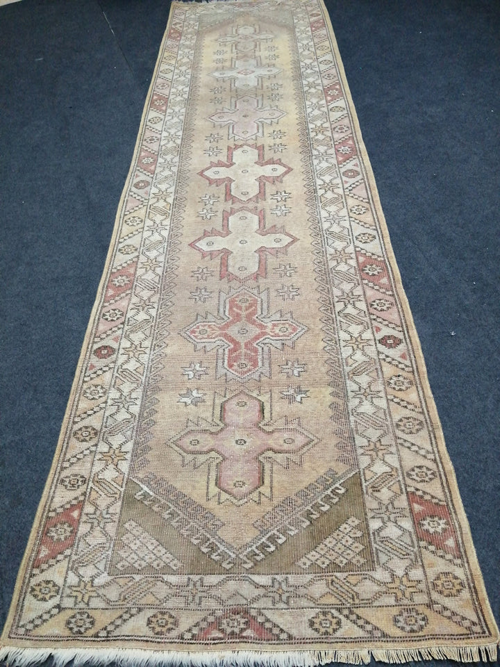 Beige Turkish Runner Rug 3' x 10' Hand-Knotted texture