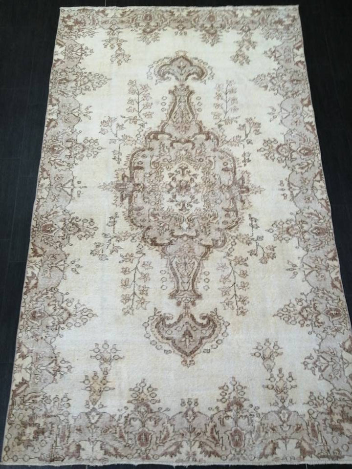 Beige Turkish Oushak Rug 5' 4" x 8' 11" Hand-Knotted close-up