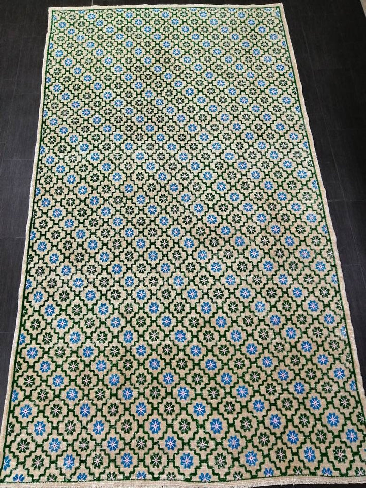 Turkish Oushak Rug 5' 5" x 9' 8" Hand-Knotted field