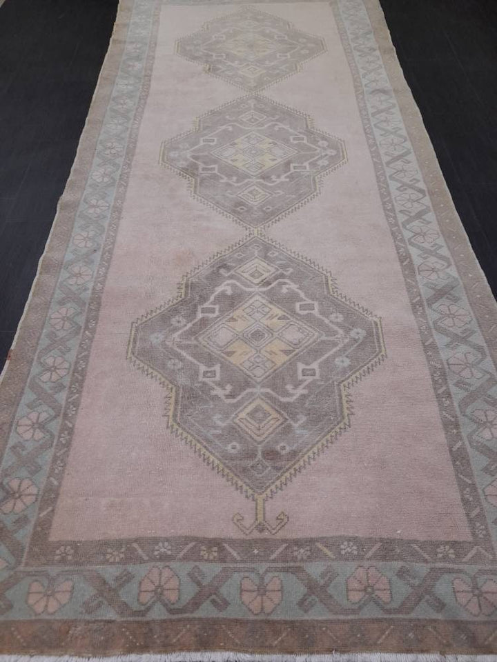 Tan Turkish Runner Rug 4' 9" x 11' 1" Hand-Knotted texture
