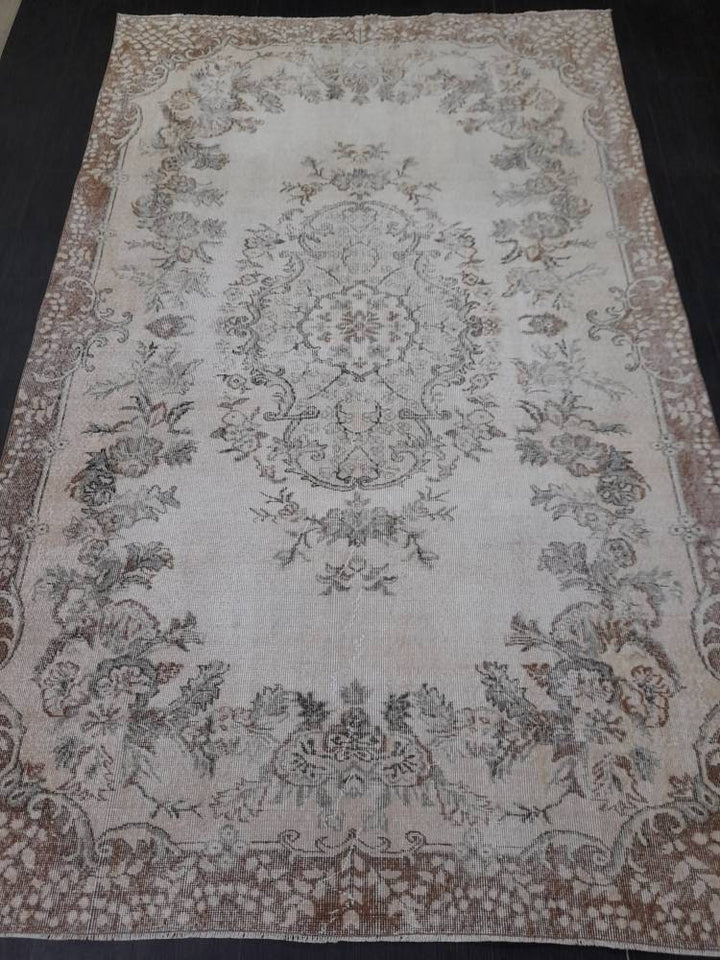 Tan Turkish Oushak Rug 6' 4" x 10' 3" Hand-Knotted close-up