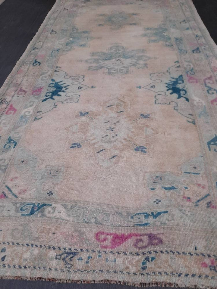 Beige Turkish Runner Rug 4' 8" x 8' 10" Hand-Knotted close-up