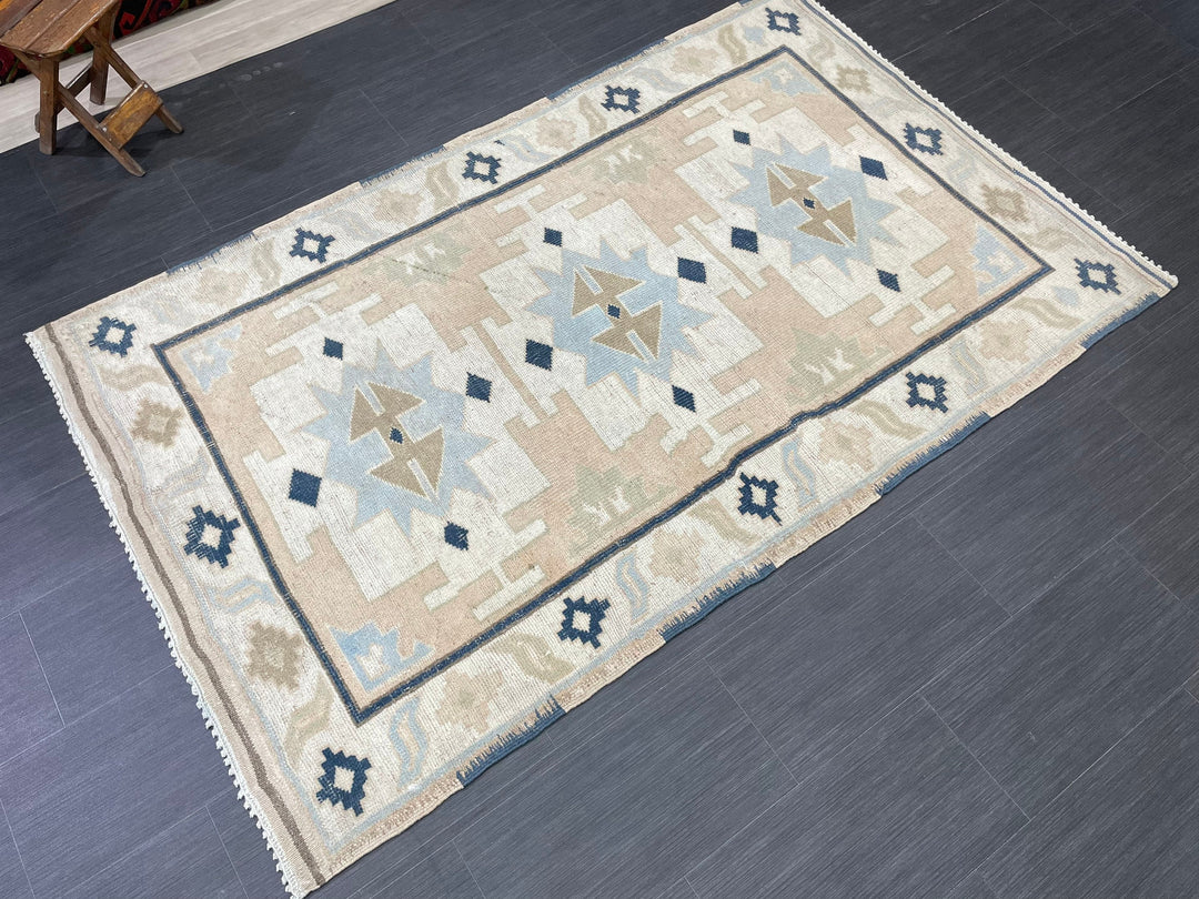 Beige Turkish Oushak Rug 4' 4" x 6' 10" Hand-Knotted close-up