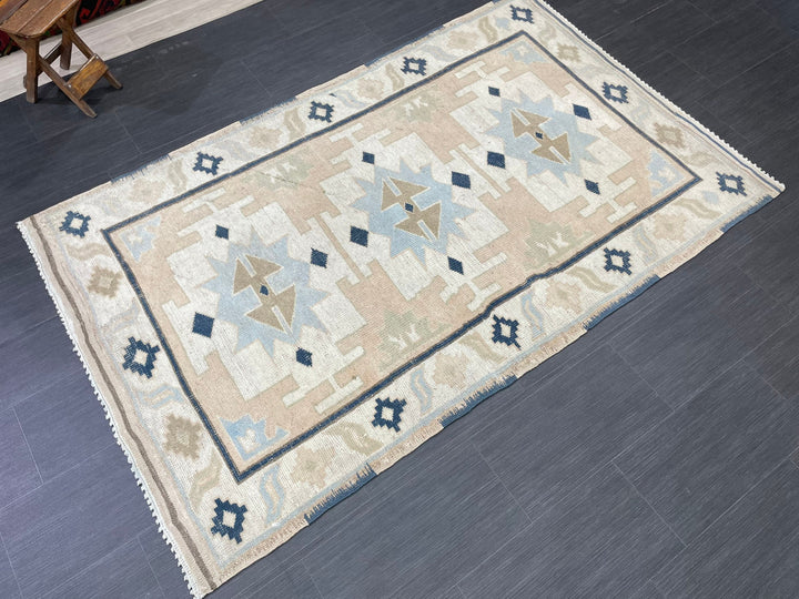 Beige Turkish Oushak Rug 4' 4" x 6' 10" Hand-Knotted close-up