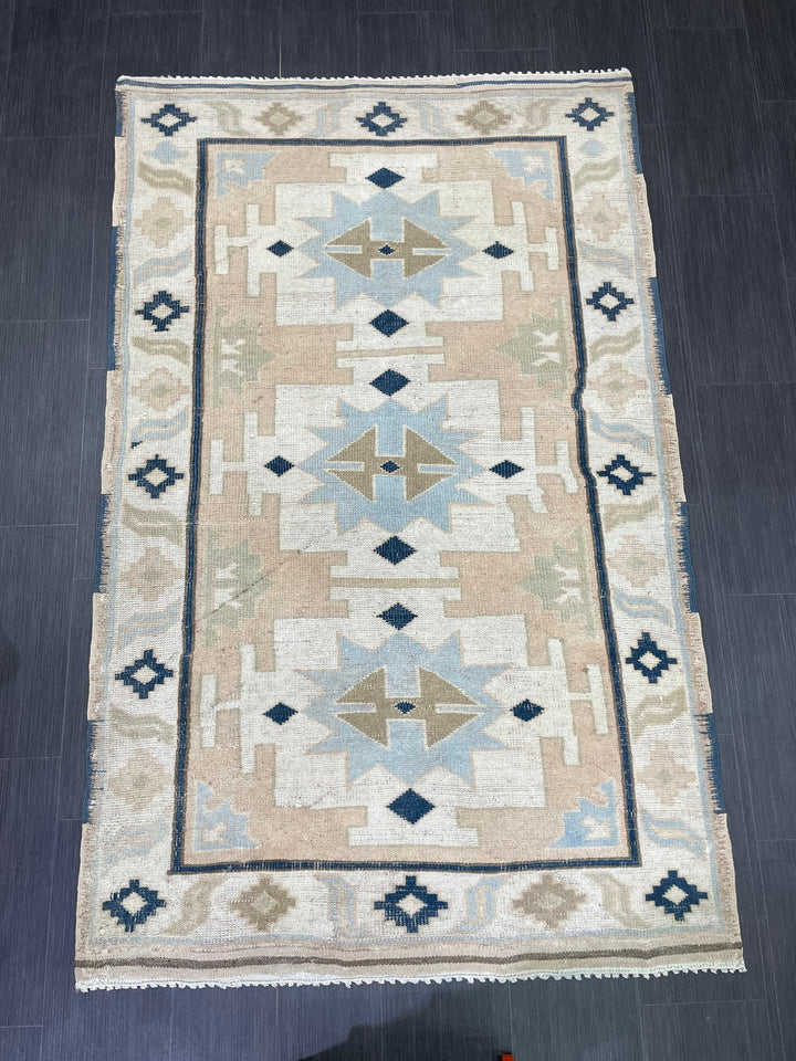 Beige Turkish Oushak Rug 4' 4" x 6' 10" Hand-Knotted texture