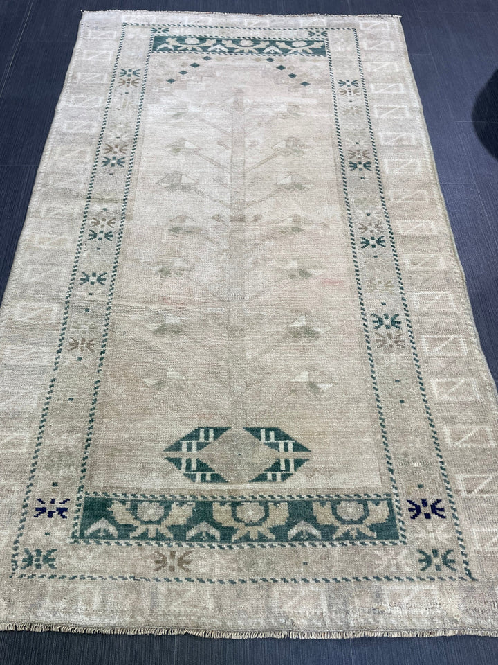 Beige Turkish Oushak Rug 3' 1" x 5' 2" Hand-Knotted close-up