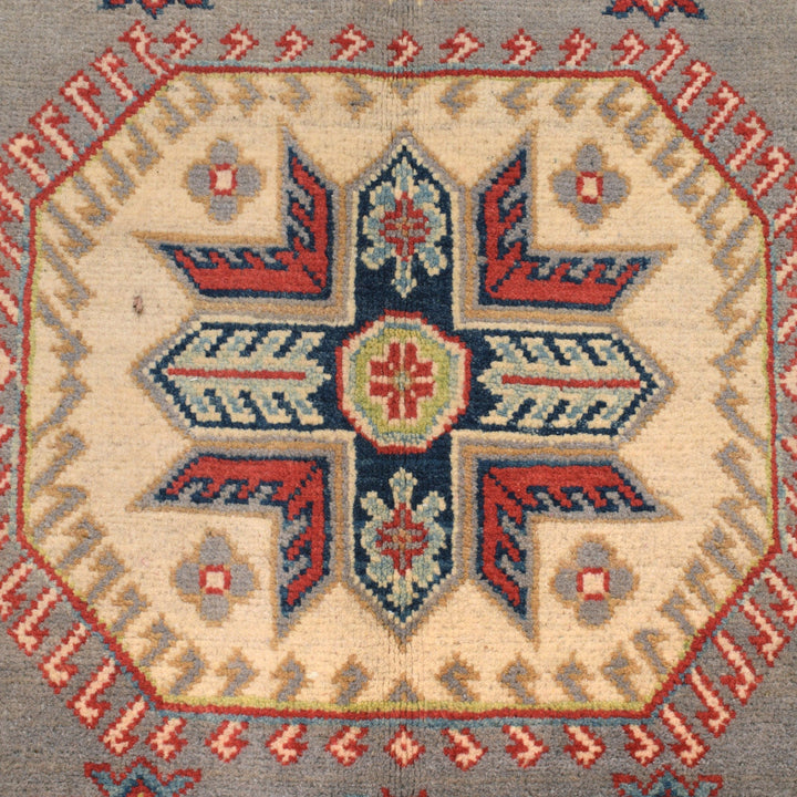Gray Afghan Kazak Rug 5'7" x 8'0" Hand-Knotted close-up