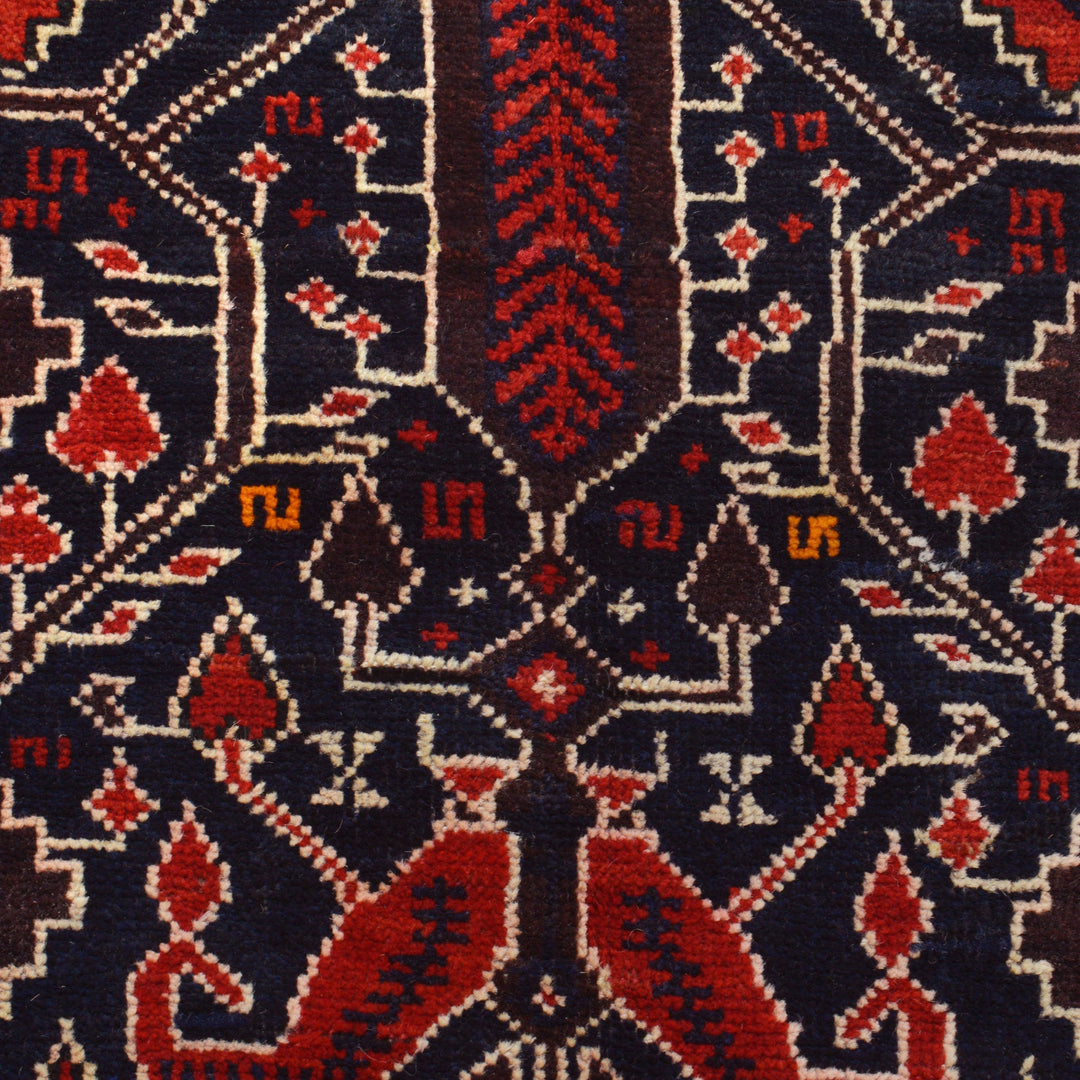 Afghan Baluchi Rug 4' 0" x 5' 9" Hand-Knotted close-up