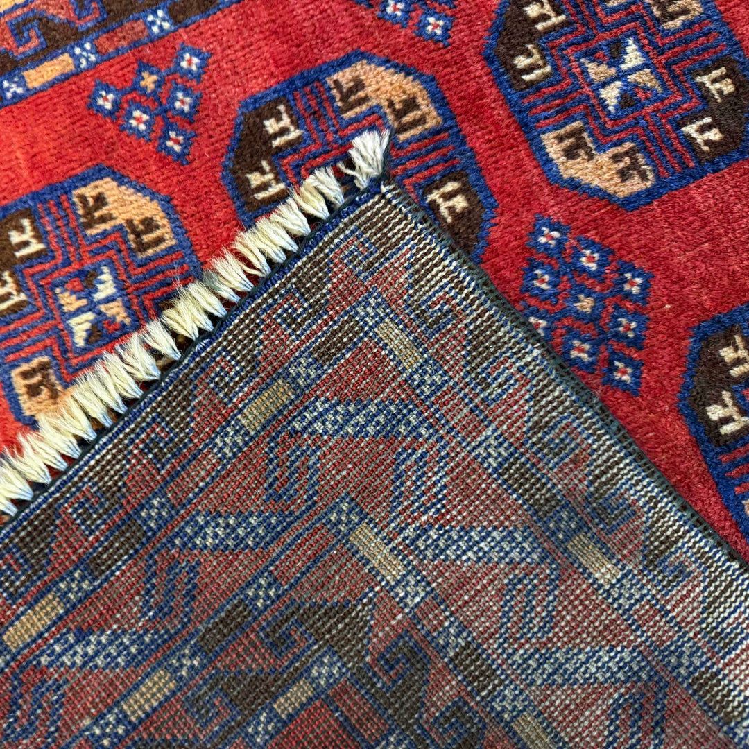 Afghan Baluchi Rug 2' 9" x 4' 8" Hand-Knotted field