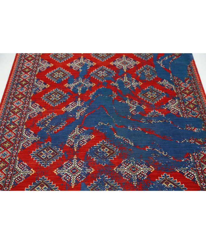 Red Pakistani Oriental Rug 4' 0" × 6' 0" Hand-Knotted close-up