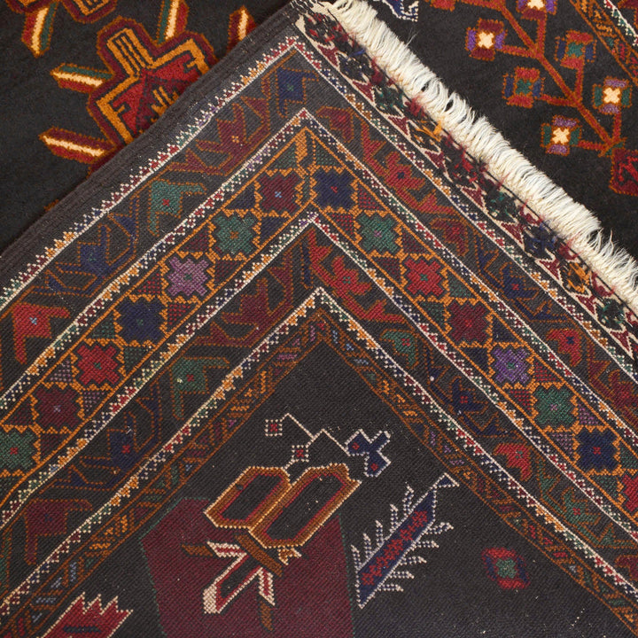 Afghan Baluchi Rug 3' 10" x 6' 2" Hand-Knotted close-up